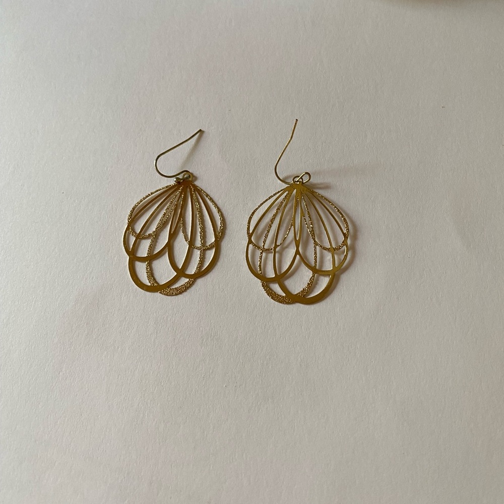 Francesca’s gold dangly earrings
